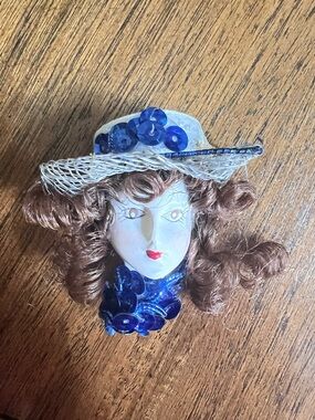 Vintage brooch doll lady head lady’s head with hat and sequined scarf artisan